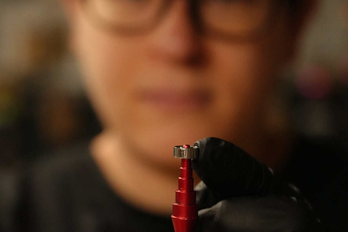 A spool bearing checked on a red bearing tool in the Berlin workshop