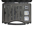 Baitcaster Reel Tool Kit in an open black case with tweezers, brush, hex key, black tools and two small parts boxes in foam