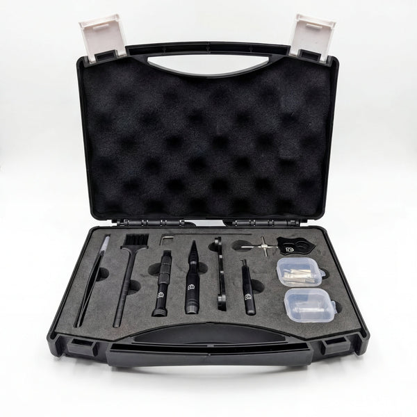 Baitcaster Reel Tool Kit open in a black foam-lined case with tweezers, a brush, black tools and two small clear parts boxes