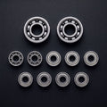 Full bearing kit for Shimano 22 Aldebaran BFS: 11 bearings laid out, 2 Apex, 2 Edge Open and 7 Core
