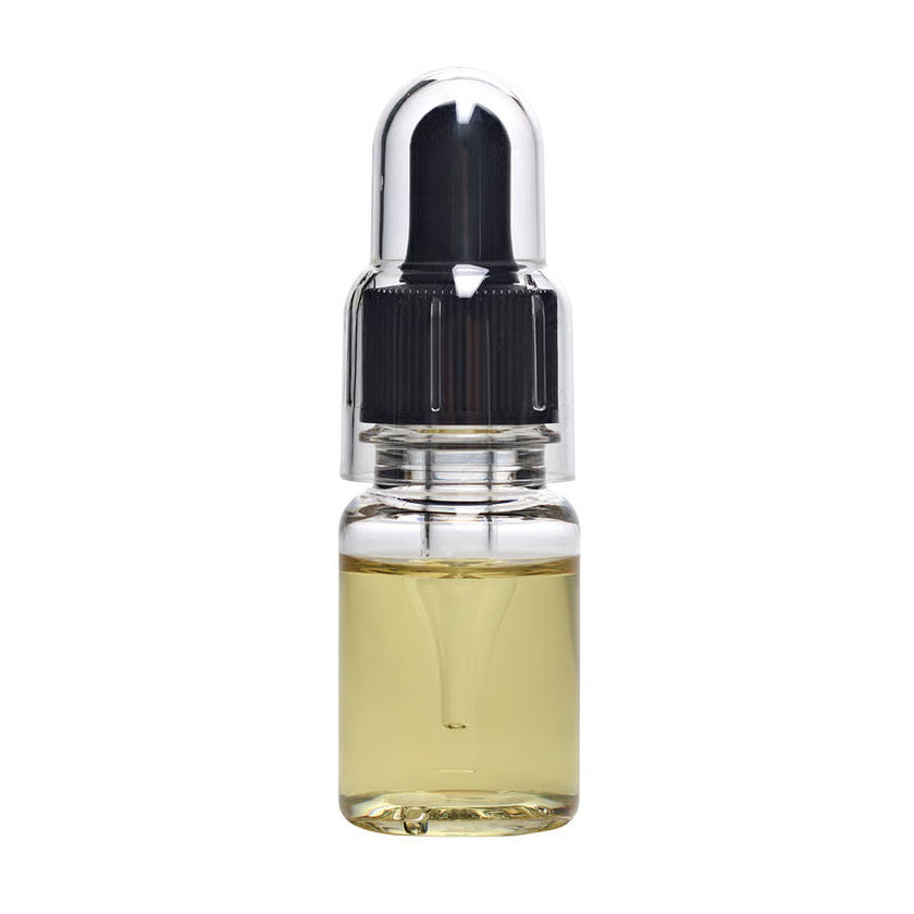 Glitch Oil Creep in a small clear dropper bottle with black cap and clear cover, filled with pale yellow oil, on white