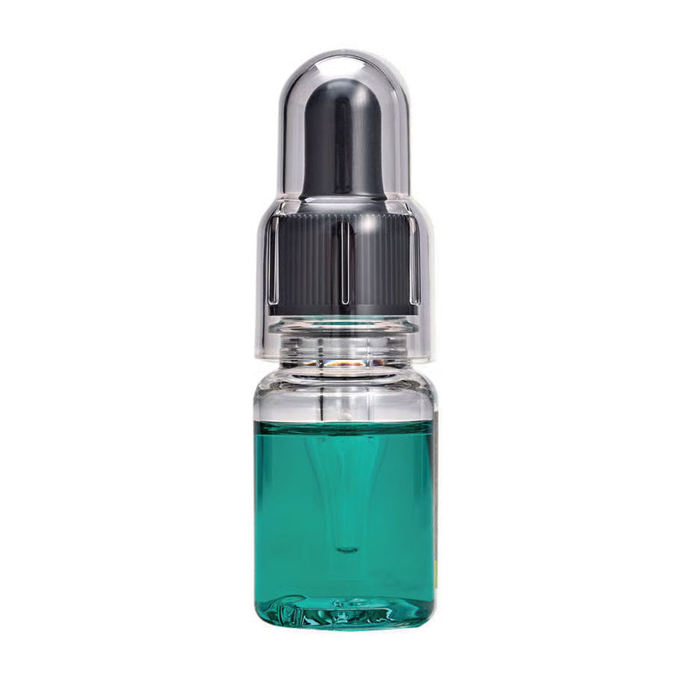 Glitch Oil High spec in a clear dropper bottle with teal oil and a black dropper under a clear cap, on a white background