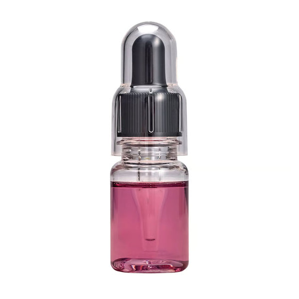 Glitch Oil Rosa in a small clear dropper bottle with pink oil, black dropper cap and clear outer cover, on a white background