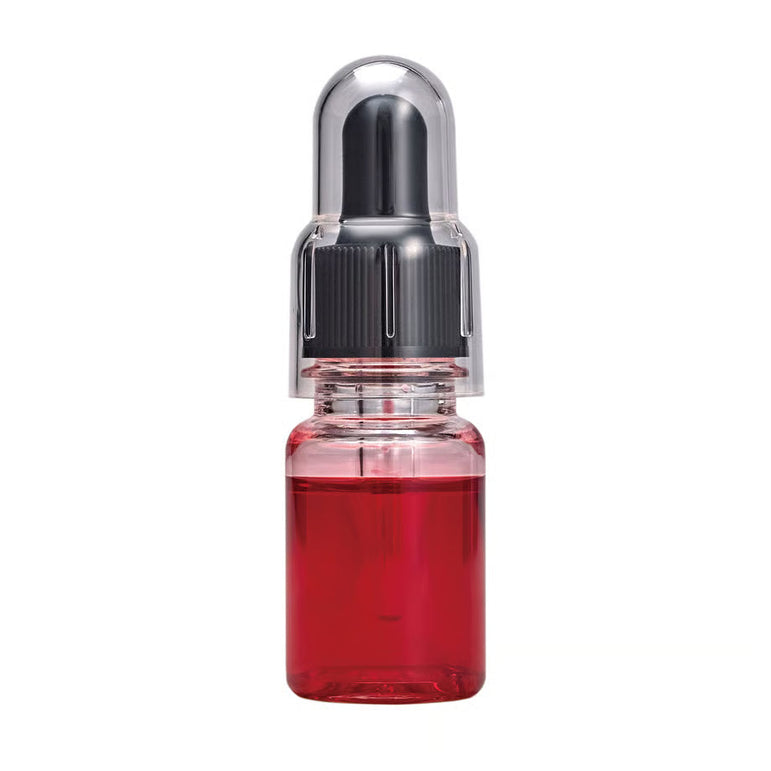 Glitch Oil Tefrosso in a small clear bottle filled with red oil, with a black dropper cap under a clear cover, on white