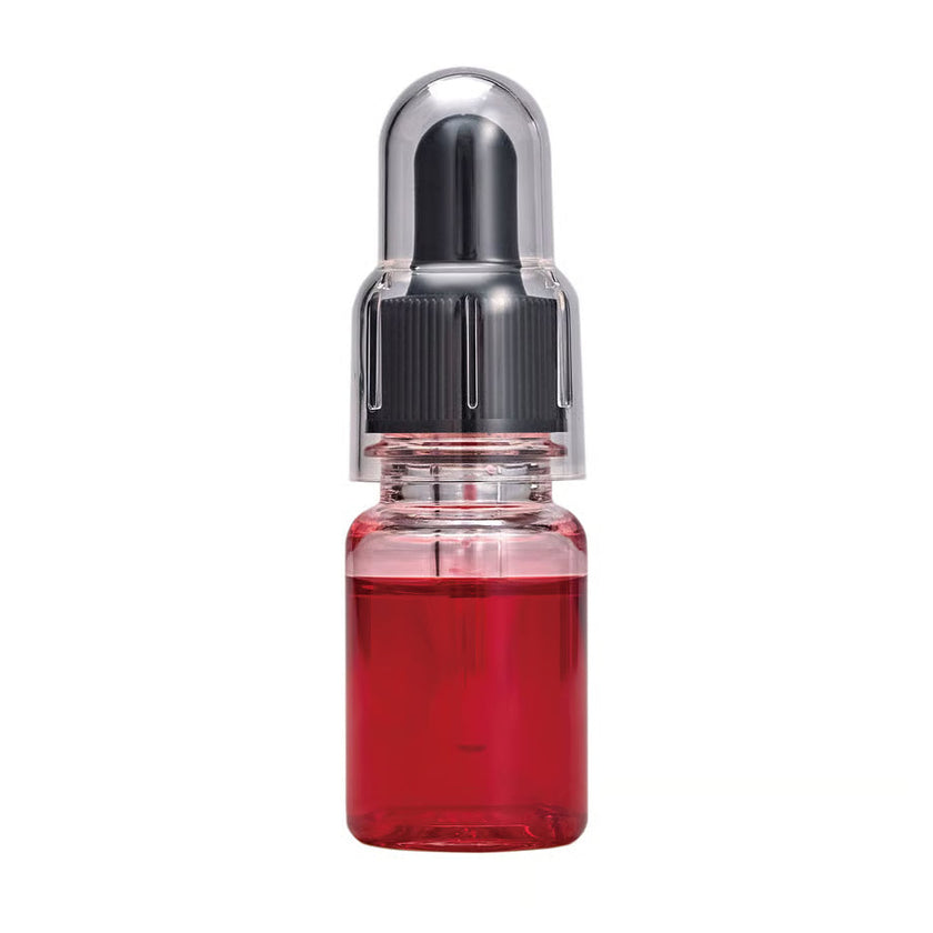 Glitch Oil Tefrosso in a small clear bottle filled with red oil, with a black dropper cap under a clear cover, on white